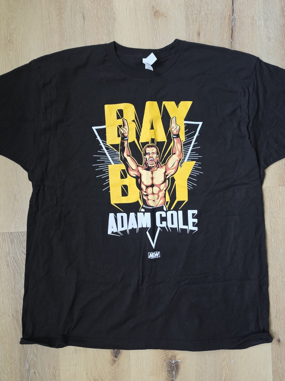 AEW Adam Cole Black Graphic Tee with Yellow 'Bay Bay' Design